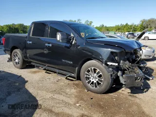 2021 Nissan Titan SV с VIN 1N6AA1EFXMN509569, выставлен на аукционе Copart как лот 52285595 с пробегом 70 296 миль миль и На запчасти • Non repairable. История ставок и продаж доступна на DreamBid. Изображение 4.