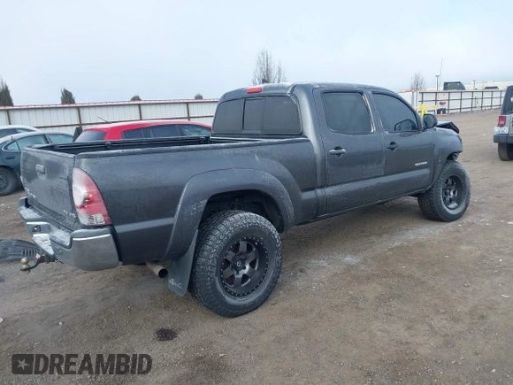 2015 Toyota Tacoma with VIN 3TMMU4FN0FM085444, listed as a IAAI auction lot 41388229 with 139,802 mi miles and . Bid and sale history available at DreamBid. Image 4.