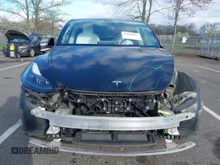 2022 Tesla Model Y Long Range with VIN 7SAYGAEE4NF522330, listed as a IAAI auction lot 42046691 with 59,980 mi miles and . Bid and sale history available at carsss.com. Image 11.