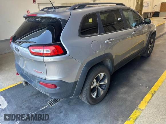 2014 Jeep Cherokee Trailhawk with VIN 1C4PJMBS4EW111480, listed as a Copart auction lot 67399485 with 162,555 mi miles and Clean title. Bid and sale history available at DreamBid. Image 4.