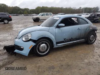 2012 Volkswagen Beetle 2.5L w/Sun with VIN 3VWJX7AT5CM652340, listed as a Copart auction lot 77817684 with 0 mi miles and Salvage Title. Bid and sale history available at carsss.com. Image 1.