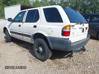 1998 Isuzu Rodeo with VIN 4S2CK58D3W4301606, listed as a IAAI auction lot 42453329 with 219,433 mi miles and . Bid and sale history available at DreamBid. Image 3.