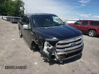 2015 Ford F-150 XLT with VIN 1FTEW1EF2FKE26597, listed as a Copart auction lot 58212385 with 123,756 mi miles and Salvage title. Bid and sale history available at DreamBid. Image 13.