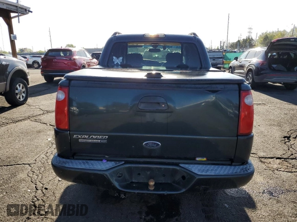 2004 Ford Explorer Sport Trac XLS z VIN 1FMDU77K04UB85358, wystawiony jako Copart lot #55636625 z przebiegiem 155 953 mil mil oraz Szkoda całkowita • Salvage title. Historia ofert i sprzedaży dostępna na DreamBid. Obrazek 6.