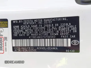 2007 Toyota Camry CE with VIN 4T1BE46K27U700563, listed as a IAAI auction lot 42080006 with 203,027 mi miles. Bid and sale history available at carsss.com. Image 9.