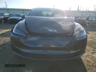 2024 Tesla Model 3 z VIN 5YJ3E1EA7RF760219, wystawiony jako Copart lot #52173225 z przebiegiem 6 730 mil mil oraz Szkoda całkowita • Salvage title. Historia ofert i sprzedaży dostępna na DreamBid. Obrazek 5.