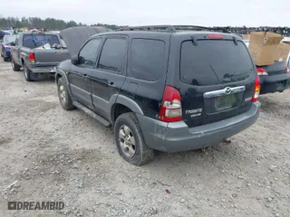 2002 Mazda Tribute LX with VIN 4F2YU08192KM35689, listed as a IAAI auction lot 41356009 with 217,866 mi miles. Bid and sale history available at carsss.com. Image 3.