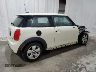 2015 MINI Hardtop with VIN WMWXM5C58FT973235, listed as a Copart auction lot 49988015 with 119,683 mi miles and Salvage Title. Bid and sale history available at DreamBid. Image 3.