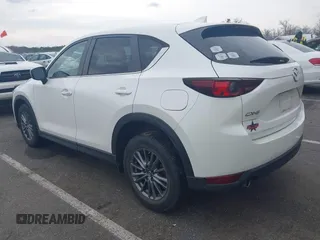 2017 Mazda CX-5 Touring with VIN JM3KFACL5H0189296, listed as a IAAI auction lot 42042328 with 60,208 mi miles and . Bid and sale history available at carsss.com. Image 3.
