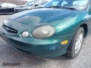 1999 Ford Taurus SE with VIN 1FAFP53S5XA102534, listed as a IAAI auction lot 41740212 with 154,926 mi miles. Bid and sale history available at carsss.com. Image 14.