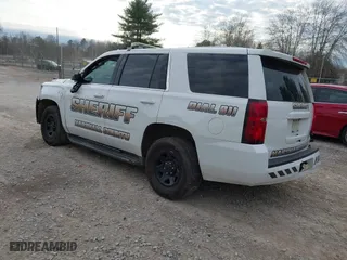 2020 Chevrolet Tahoe Commercial with VIN 1GNLCDEC7LR199179, listed as a IAAI auction lot 41502623 with 87,271 mi miles. Bid and sale history available at carsss.com. Image 3.