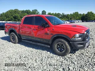 2017 Ram 1500 Rebel with VIN 1C6RR7YT2HS674131, listed as a Copart auction lot 61403835 with 24,675 mi miles and Salvage title. Bid and sale history available at DreamBid. Image 4.