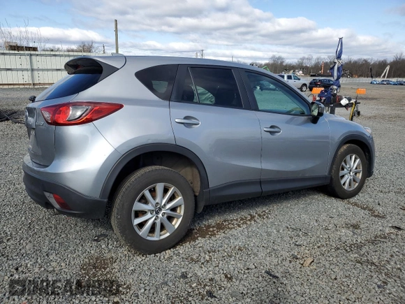 2014 Mazda CX-5 Touring with VIN JM3KE4CY4E0427294, listed as a Copart auction lot 51372155 with 121,324 mi miles and Salvage Title. Bid and sale history available at carsss.com. Image 3.
