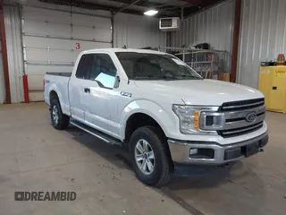 2020 Ford F-150 XL with VIN 1FTFX1E42LKD79888, listed as a IAAI auction lot 41511954 with 163,904 mi miles. Bid and sale history available at carsss.com. Image 1.