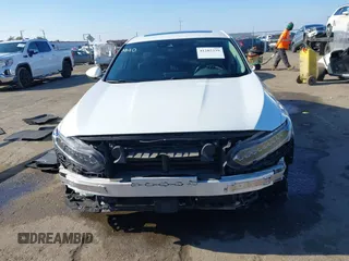 2018 Honda Accord Touring z VIN 1HGCV3F96JA014262, wystawiony jako IAAI lot #41285339 z przebiegiem 86 670 mil mil oraz . Historia ofert i sprzedaży dostępna na DreamBid. Obrazek 13.