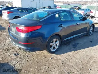 2015 Kia Optima LX with VIN 5XXGM4A75FG394494, listed as a IAAI auction lot 41596274 with 1 mi miles. Bid and sale history available at carsss.com. Image 4.