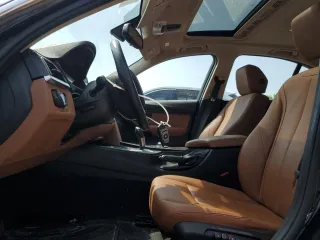 2012 BMW 3 Series 328i with VIN WBA3A5C57CF345040, listed as a Copart auction lot 63761735 with 106,665 mi miles and Clean title. Bid and sale history available at DreamBid. Image 7.