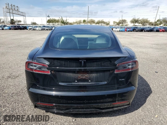 2022 Tesla Model S Plaid z VIN 5YJSA1E64NF461218, wystawiony jako Copart lot #84467644 z przebiegiem Nie podano mil oraz Szkoda całkowita • Salvage title. Historia ofert i sprzedaży dostępna na DreamBid. Obrazek 6.