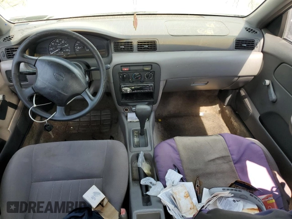 1997 Nissan Sentra XE z VIN 3N1AB41D3VL035555, wystawiony jako Copart lot #76200984 z przebiegiem 166 012 mil mil oraz Szkoda całkowita • Salvage title. Historia ofert i sprzedaży dostępna na DreamBid. Obrazek 8.