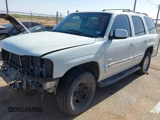 2005 GMC Yukon SLT z VIN 1GKEC13TX5R276234, wystawiony jako IAAI lot #42127846 z przebiegiem 210 802 mil mil oraz . Historia ofert i sprzedaży dostępna na DreamBid. Obrazek 18.