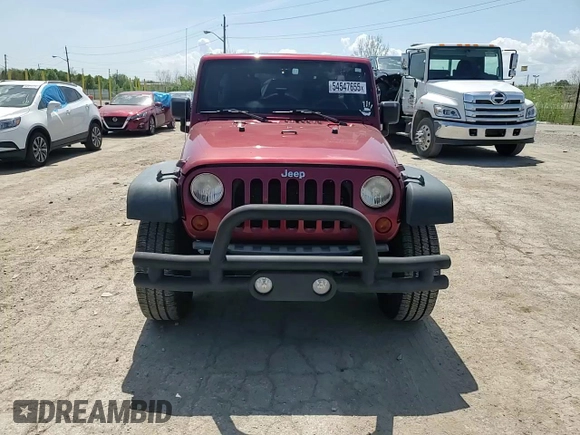 2012 Jeep Wrangler Unlimited Sport z VIN 1C4BJWDG7CL214633, wystawiony jako Copart lot #54547655 z przebiegiem 80 720 mil mil oraz Szkoda całkowita • Salvage title. Historia ofert i sprzedaży dostępna na DreamBid. Obrazek 14.