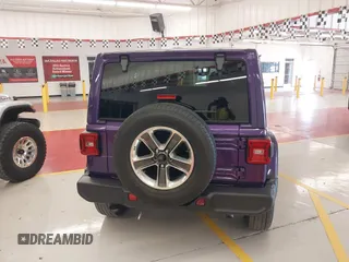 2023 Jeep Wrangler High Altitude z VIN 1C4HJXEN9PW560958, wystawiony jako IAAI lot #42393559 z przebiegiem 35 981 mil mil oraz . Historia ofert i sprzedaży dostępna na DreamBid. Obrazek 17.