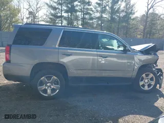2019 Chevrolet Tahoe LT with VIN 1GNSKBKC0KR121493, listed as a IAAI auction lot 41656734 with 163,994 mi miles. Bid and sale history available at carsss.com. Image 13.