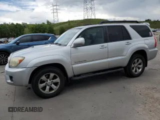 2008 Toyota 4Runner SR5 with VIN JTEBU14R88K018706, listed as a Copart auction lot 60085725 with 230,698 mi miles and Salvage title. Bid and sale history available at DreamBid. Image 1.