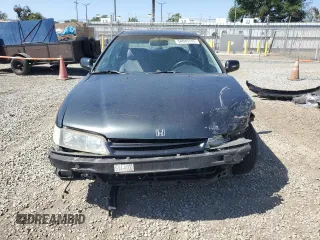1994 Honda Accord DX with VIN 1HGCD5624RA099843, listed as a Copart auction lot 54045515 with 235,899 mi miles and Salvage Title. Bid and sale history available at carsss.com. Image 5.