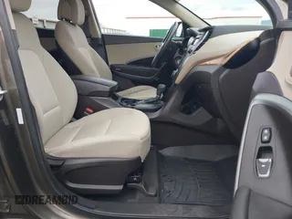 2014 Hyundai Santa Fe z VIN 5XYZTDLB1EG144290, wystawiony jako IAAI lot #42126367 z przebiegiem 138 525 mil mil oraz . Historia ofert i sprzedaży dostępna na DreamBid. Obrazek 5.