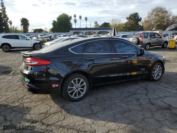 2018 Ford Fusion Energi Titanium with VIN 3FA6P0SU2JR110349, listed as a Copart auction lot 71508532 with 116,330 mi miles. Bid and sale history available at carsss.com. Image 3.