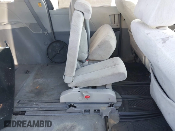 2013 Toyota Sienna LE AAS with VIN 5TDKK3DCXDS287357, listed as a IAAI auction lot 41172499 with 243,950 mi miles and . Bid and sale history available at DreamBid. Image 8.
