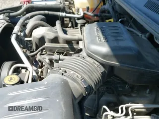 1999 Jeep Grand Cherokee Laredo z VIN 1J4G258S7XC656551, wystawiony jako IAAI lot #42182464 z przebiegiem 230 709 mil mil oraz . Historia ofert i sprzedaży dostępna na DreamBid. Obrazek 12.