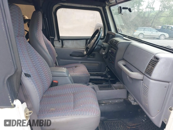 1998 Jeep Wrangler SE with VIN 1J4FY29P0WP792787, listed as a IAAI auction lot 42631661 with 190,180 mi miles and . Bid and sale history available at DreamBid. Image 5.
