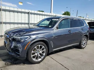 2020 BMW X5 xDrive40i with VIN 5UXCR6C06LLL75359, listed as a Copart auction lot 60897885 with 66,631 mi miles and Salvage title. Bid and sale history available at DreamBid. Image 1.