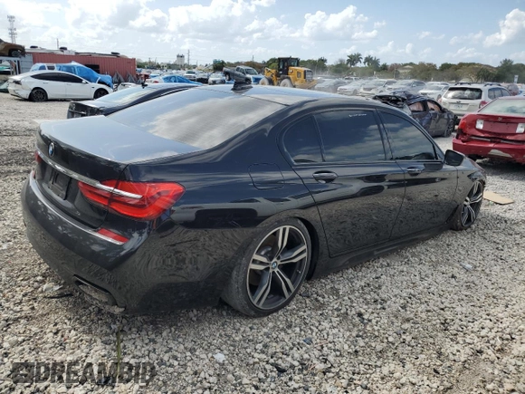 2017 BMW 7 Series 740i with VIN WBA7E2C34HG741026, listed as a Copart auction lot 52792995 with 91,462 mi miles and Salvage Title. Bid and sale history available at carsss.com. Image 3.