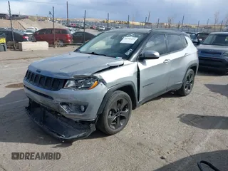 2020 Jeep Compass Latitude with VIN 3C4NJCBBXLT158887, listed as a IAAI auction lot 41752495 with 95,429 mi miles and . Bid and sale history available at DreamBid. Image 2.