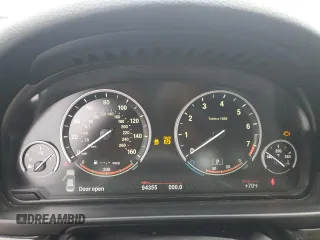 2014 BMW 5 Series 550i xDrive с VIN WBAKP9C55ED692057, выставлен на аукционе Copart как лот 59210515 с пробегом 94 355 миль миль и Списание • Salvage title. История ставок и продаж доступна на DreamBid. Изображение 9.