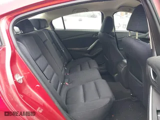 2016 Mazda Mazda6 i Sport with VIN JM1GJ1U56G1409311, listed as a IAAI auction lot 41906256 with 126,548 mi miles. Bid and sale history available at carsss.com. Image 8.