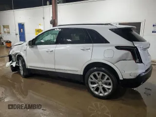 2021 Cadillac XT5 AWD Sport with VIN 1GYKNGRS5MZ142444, listed as a Copart auction lot 54502285 with 27,070 mi miles and Salvage title. Bid and sale history available at DreamBid. Image 2.