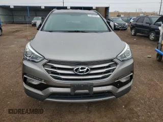 2017 Hyundai Santa Fe 2.4L z VIN 5NMZUDLB7HH030253, wystawiony jako Copart lot #51302445 z przebiegiem 136 074 mil mil oraz Szkoda całkowita • Salvage title. Historia ofert i sprzedaży dostępna na DreamBid. Obrazek 5.