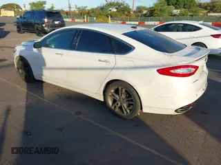 2014 Ford Fusion Titanium with VIN 3FA6P0K96ER234979, listed as a IAAI auction lot 41220106 with 98,068 mi miles. Bid and sale history available at carsss.com. Image 3.