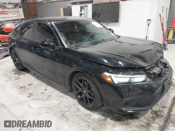 2023 Honda Civic Sport z VIN 19XFL2H85PE007244, wystawiony jako IAAI lot #41572024 z przebiegiem 21 182 mil mil oraz . Historia ofert i sprzedaży dostępna na DreamBid. Obrazek 1.