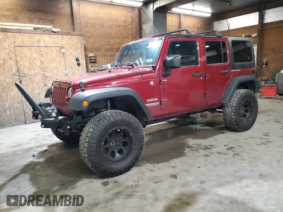 2012 Jeep Wrangler Unlimited Sport z VIN 1C4BJWDG8CL282181, wystawiony jako Copart lot #53863375 z przebiegiem 92 984 mil mil oraz Szkoda całkowita • Salvage title. Historia ofert i sprzedaży dostępna na DreamBid. Obrazek 1.