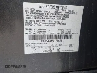 2015 Ford Taurus SEL with VIN 1FAHP2E83FG175051, listed as a IAAI auction lot 42357517 with 200,033 mi miles and . Bid and sale history available at DreamBid. Image 9.