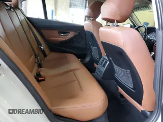 2013 BMW 3 Series 328i with VIN WBA3A5G52DNP18972, listed as a Copart auction lot 58122935 with 209,173 mi miles and Salvage title. Bid and sale history available at DreamBid. Image 11.