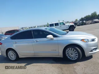 2016 Ford Fusion SE Hybrid z VIN 3FA6P0LU8GR203934, wystawiony jako IAAI lot #42595741 z przebiegiem 84 189 mil mil oraz . Historia ofert i sprzedaży dostępna na DreamBid. Obrazek 14.