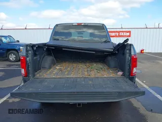 2015 Ford F-150 XLT with VIN 1FTEW1EG1FKE89277, listed as a IAAI auction lot 41752106 with 142,069 mi miles. Bid and sale history available at carsss.com. Image 18.