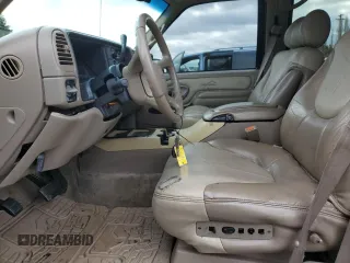 1999 GMC Denali z VIN 1GKEK13R6XR918944, wystawiony jako Copart lot #46049675 z przebiegiem 140 826 mil mil oraz Tytuł czysty. Historia ofert i sprzedaży dostępna na DreamBid. Obrazek 7.
