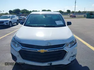 2021 Chevrolet Traverse LS with VIN 1GNERFKW0MJ240592, listed as a IAAI auction lot 42310680 with 59,986 mi miles and . Bid and sale history available at DreamBid. Image 12.
